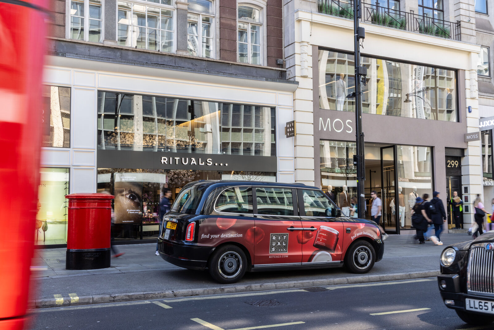 Rituals branded taxi parked outside the Rituals flagship store on Regent Street, London